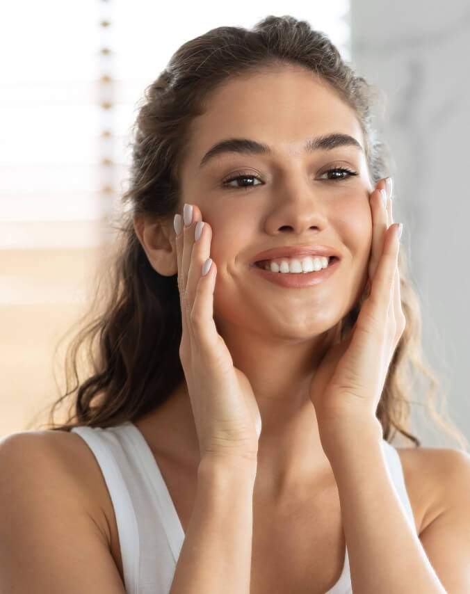 Woman Touching Her Cheeks With Fillers